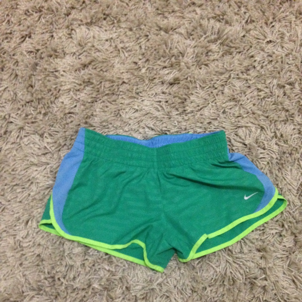 Green running shorts